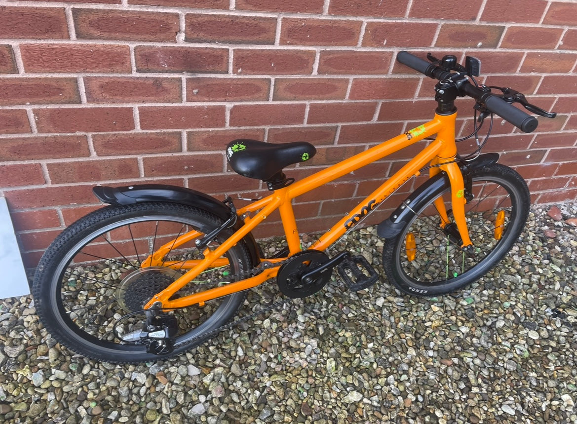 A Pre Loved Frog Bike For Sale, Orange Frog 55 Hybrid bicycle, 20” wheels, 8 speed, V brakes, mudguards, nationwide delivery is available.