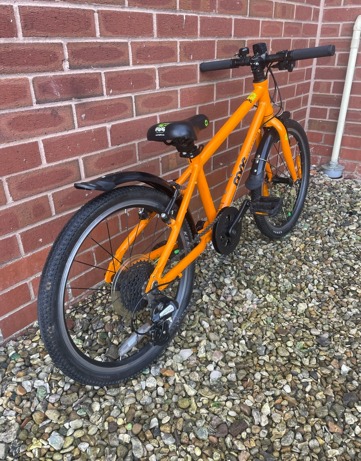 A Pre Loved Frog Bike For Sale, Orange Frog 55 Hybrid bicycle, 20” wheels, 8 speed, V brakes, mudguards, nationwide delivery is available.
