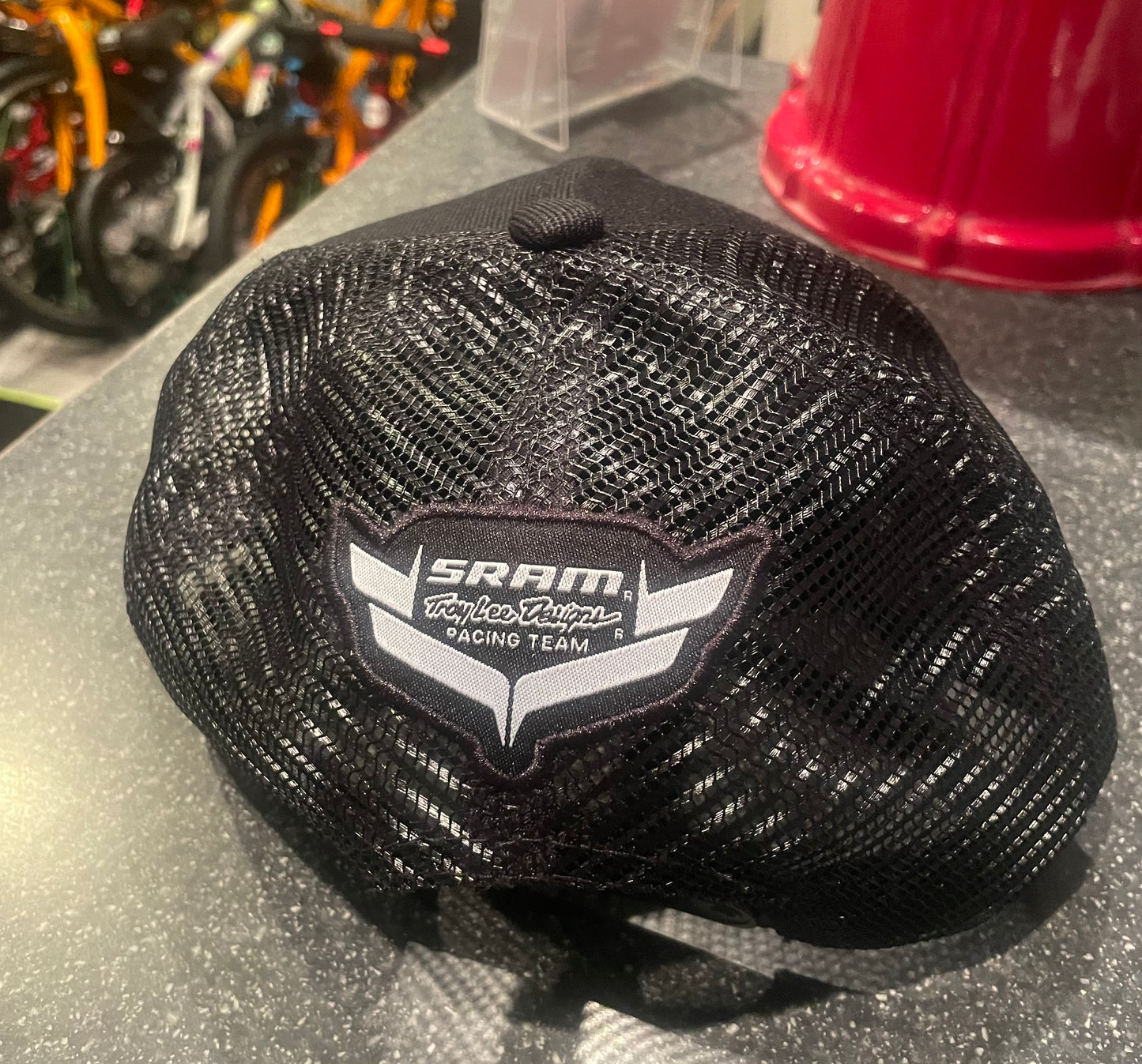 Troy Lee Designs SRAM New Era mesh trucker hat, snap back, black and black / grey.