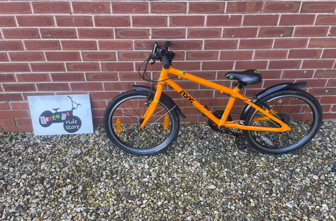 A Pre Loved Frog Bike For Sale, Orange Frog 55 Hybrid bicycle, 20” wheels, 8 speed, V brakes, mudguards, nationwide delivery is available.
