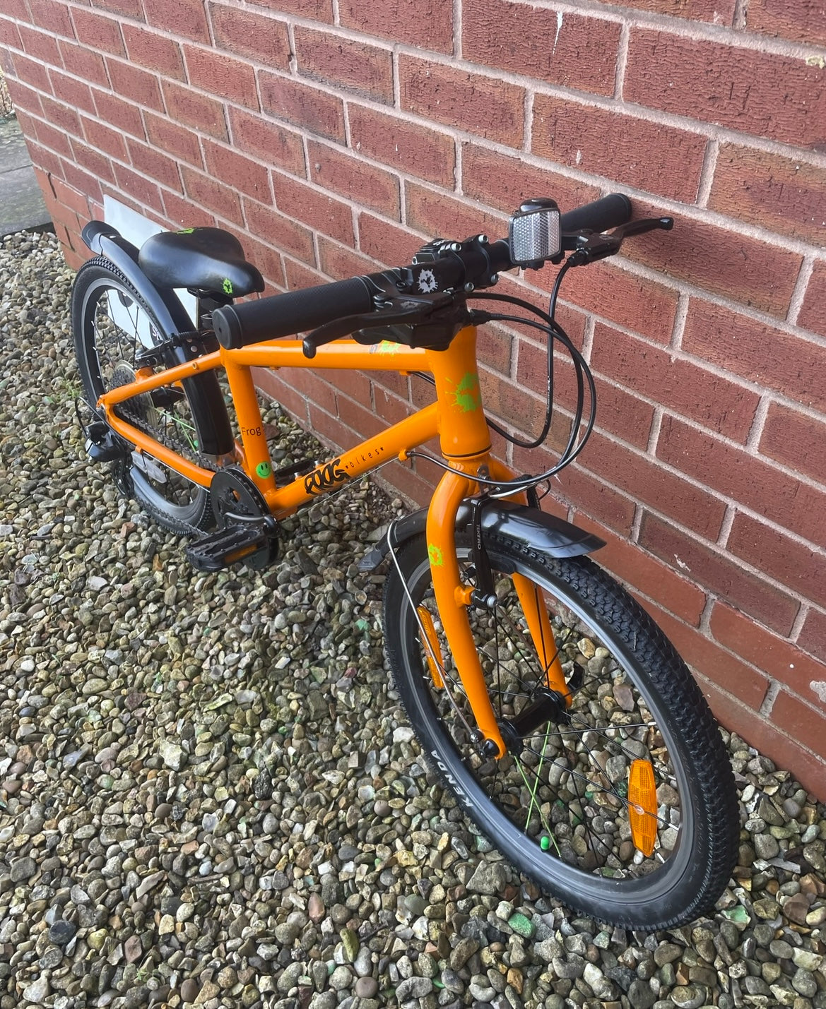 A Pre Loved Frog Bike For Sale, Orange Frog 55 Hybrid bicycle, 20” wheels, 8 speed, V brakes, mudguards, nationwide delivery is available.