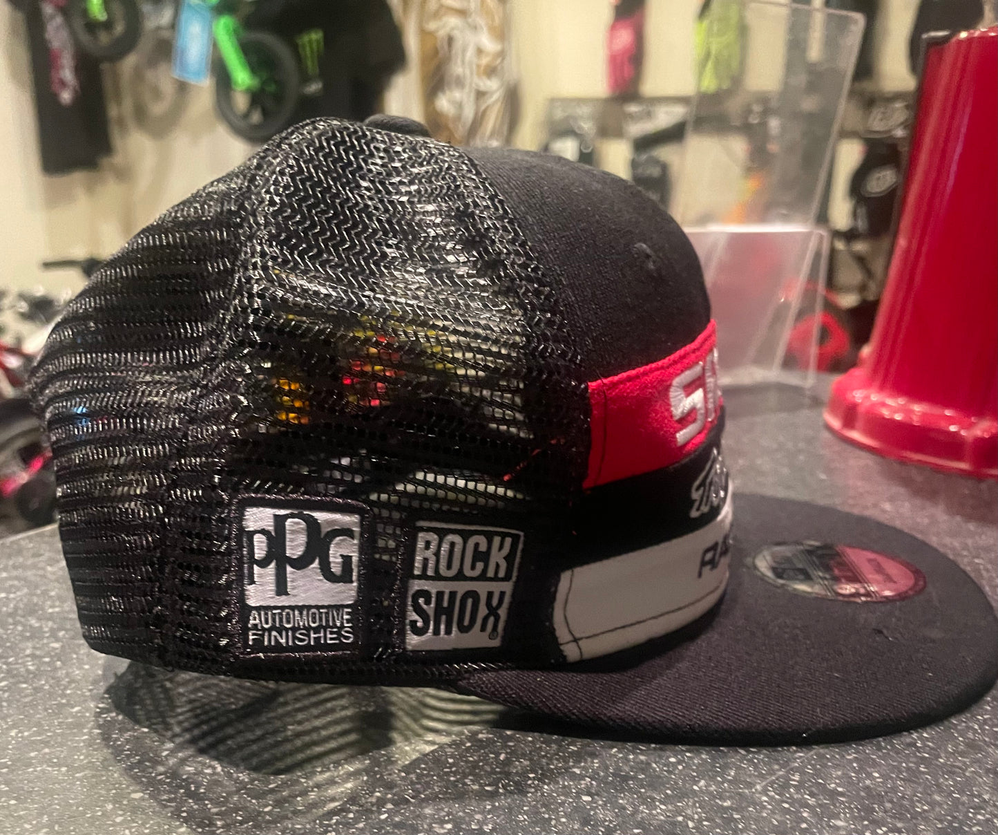Troy Lee Designs SRAM New Era mesh trucker hat, snap back, black and black / grey.