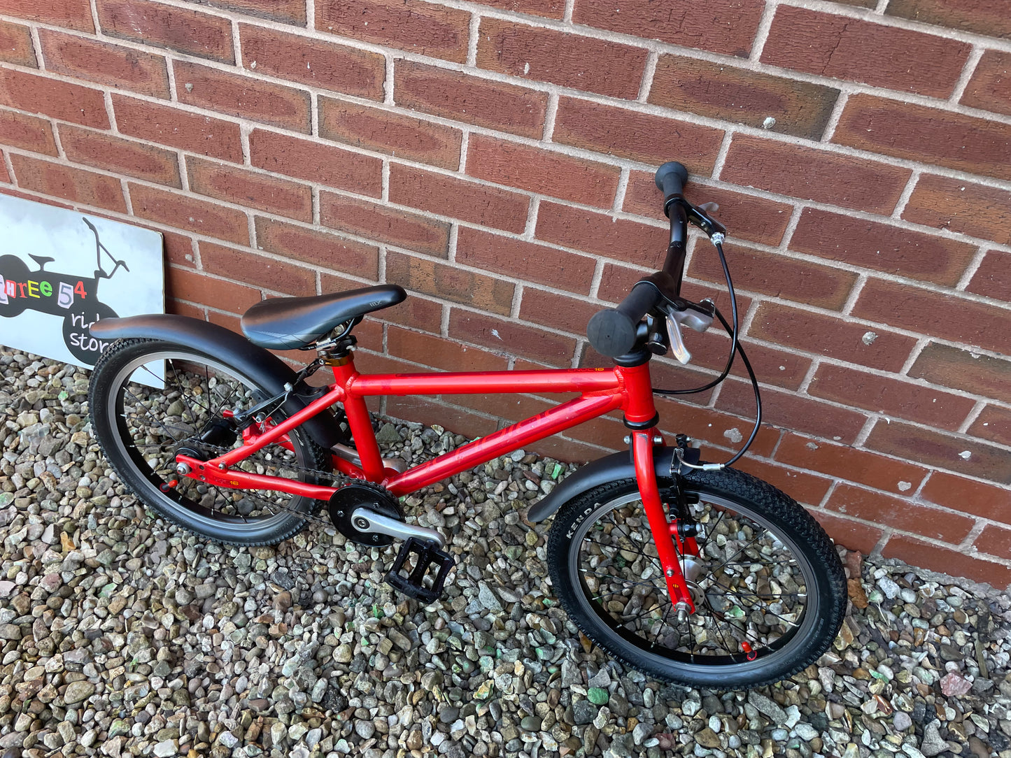 A Pre Loved Isla Bike For Sale, Red Isla Cnoc 16 First Pedal Bike, 16” wheels, V brakes, mudguards, very lightweight, nationwide delivery is available.