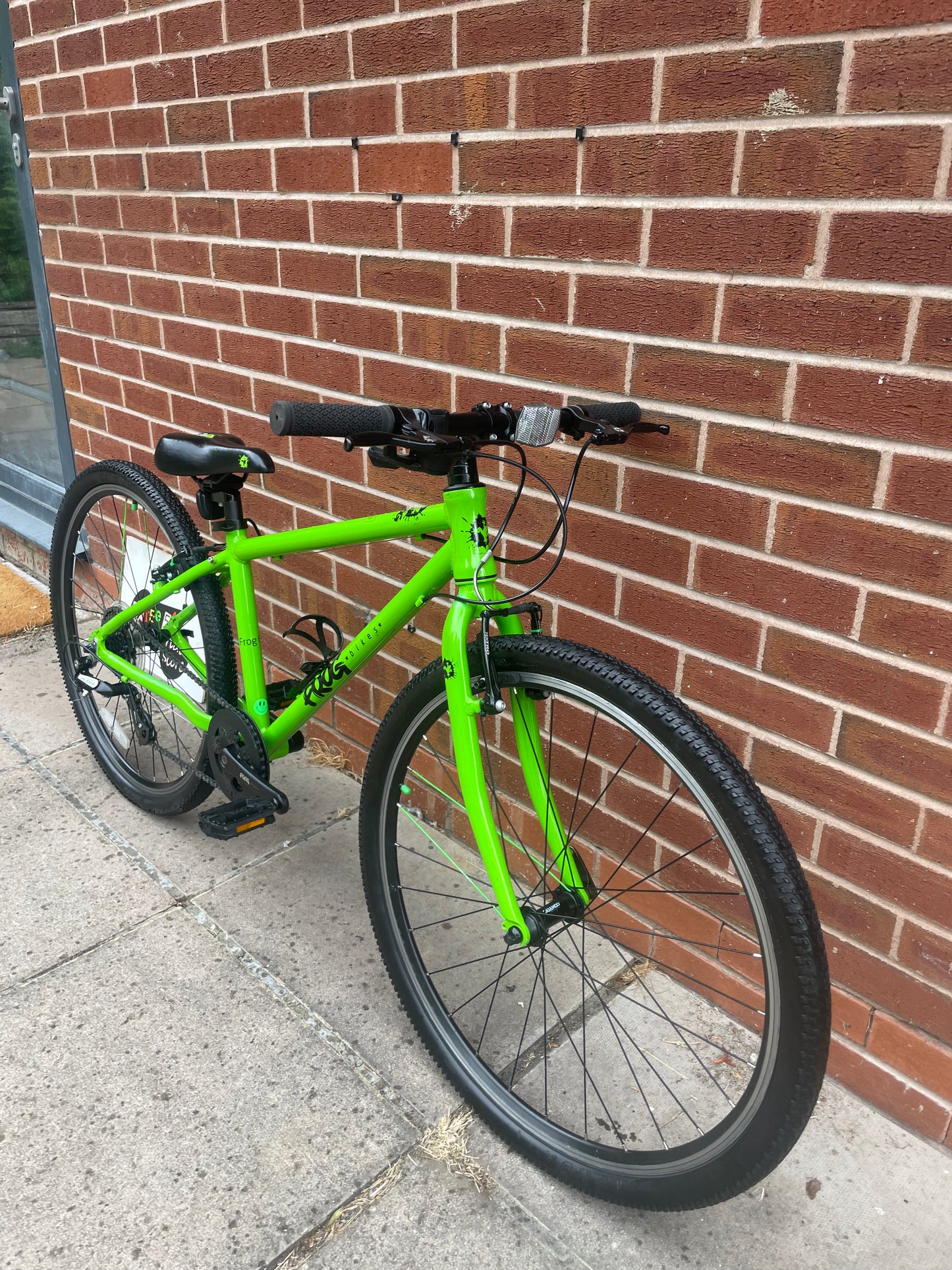 A Pre Loved Frog Bike For Sale, Green Frog 69 Hybrid Bike, 26” wheels, 8 gears, V brakes, bottle cage, 3 months warranty, nationwide delivery is available.