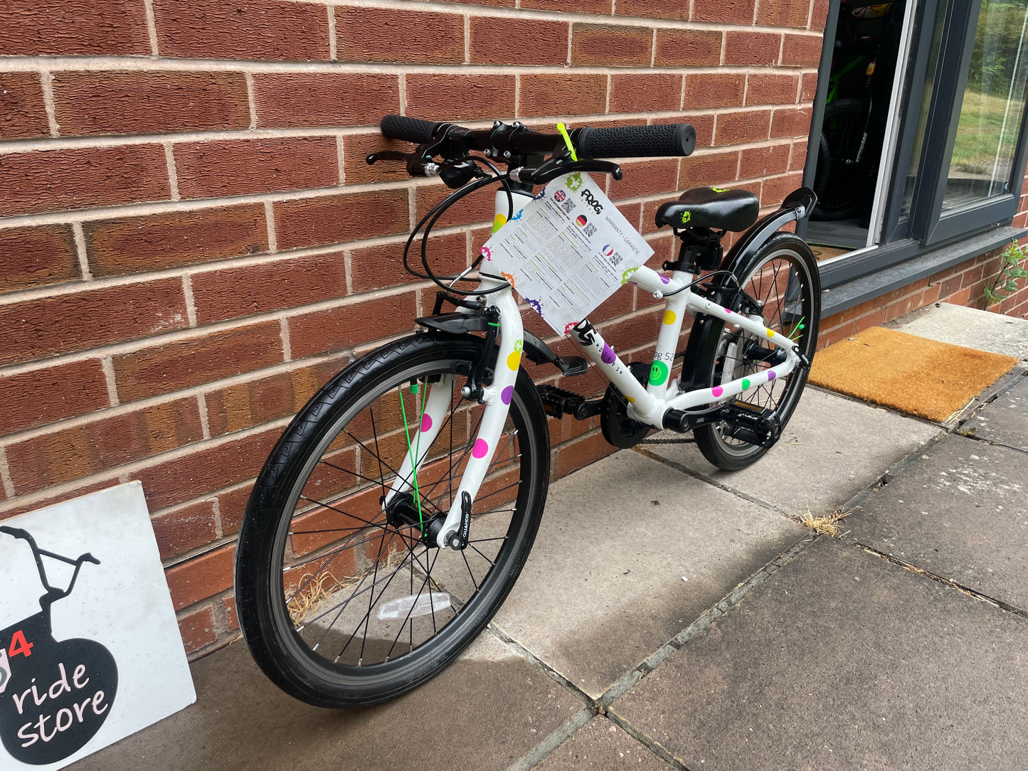 A Pre Loved Frog Bike For Sale, White/Spotty Frog 52 Hybrid Bicycle, 20” wheels, 8 gears, V brakes, mudguards, very lightweight, 3 months warranty, nationwide delivery is available.