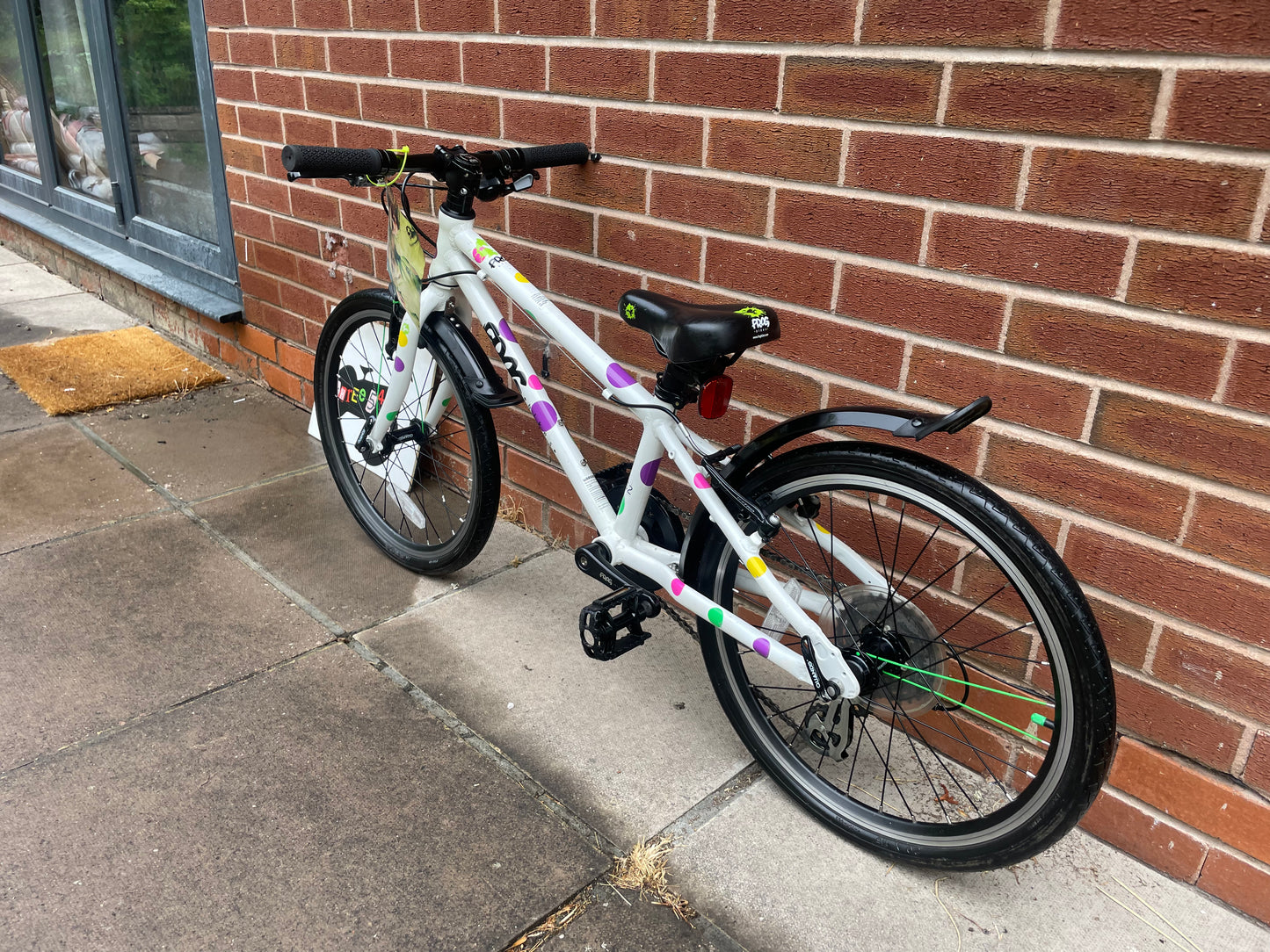 A Pre Loved Frog Bike For Sale, White/Spotty Frog 52 Hybrid Bicycle, 20” wheels, 8 gears, V brakes, mudguards, very lightweight, 3 months warranty, nationwide delivery is available.