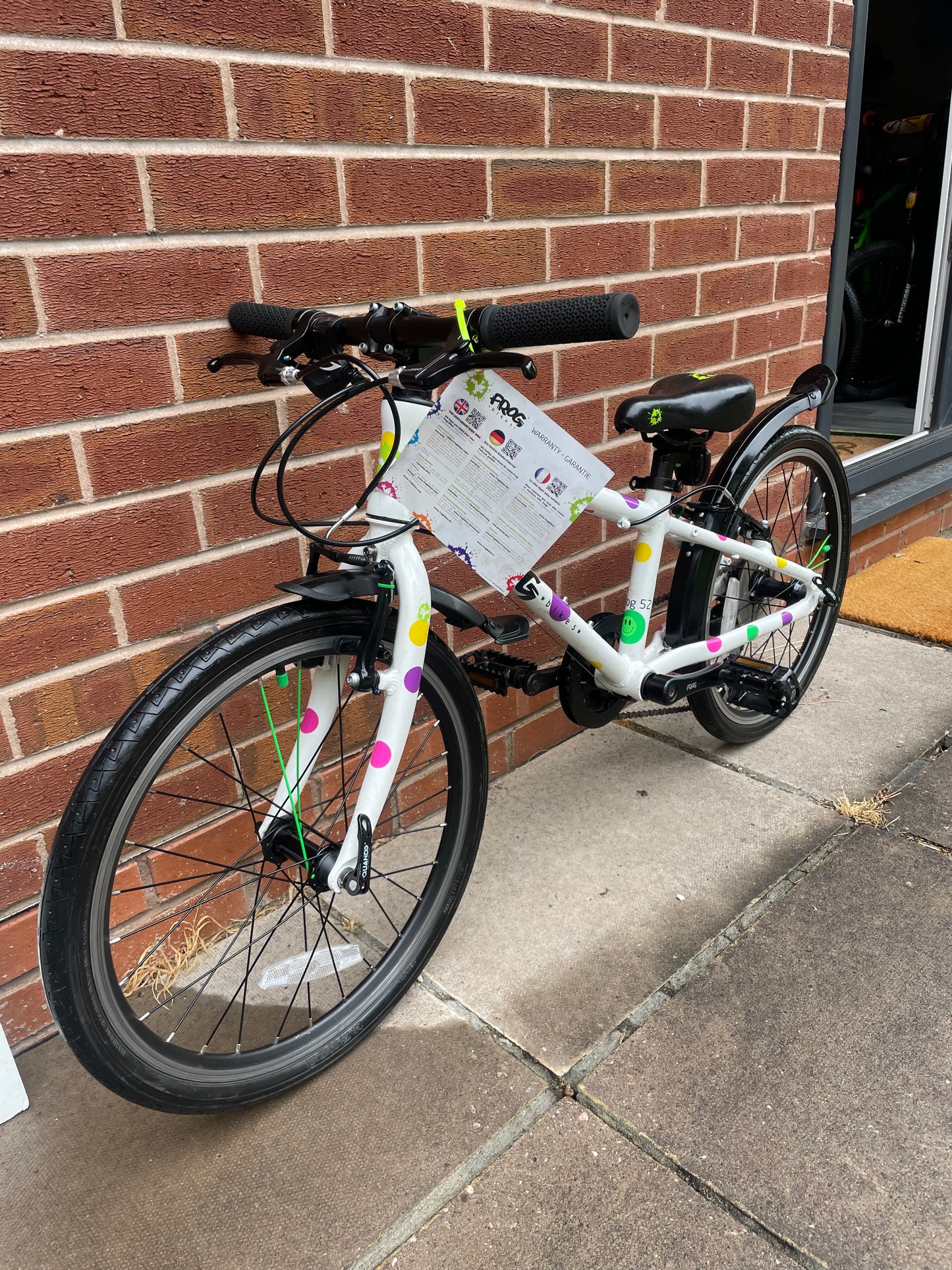 A Pre Loved Frog Bike For Sale, White/Spotty Frog 52 Hybrid Bicycle, 20” wheels, 8 gears, V brakes, mudguards, very lightweight, 3 months warranty, nationwide delivery is available.
