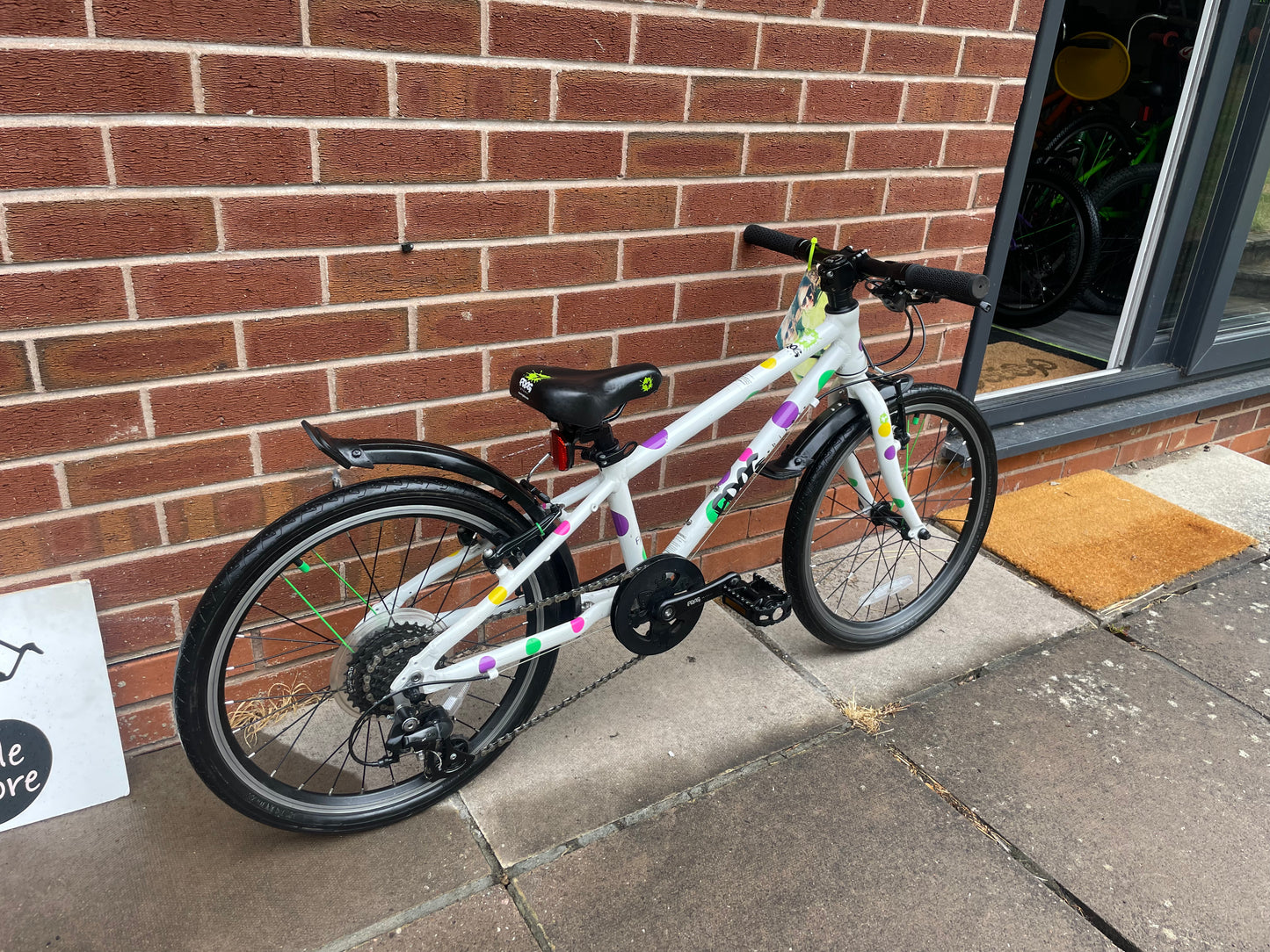 A Pre Loved Frog Bike For Sale, White/Spotty Frog 52 Hybrid Bicycle, 20” wheels, 8 gears, V brakes, mudguards, very lightweight, 3 months warranty, nationwide delivery is available.