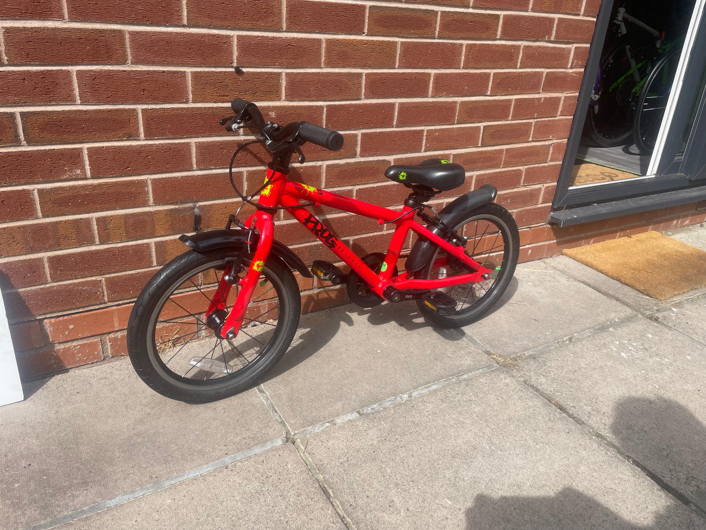 A Pre Loved Frog Bike For Sale, Red Frog 48 First Pedal Bike, 16” wheels, V brakes, padded seat, very lightweight, 3 months warranty, nationwide delivery.