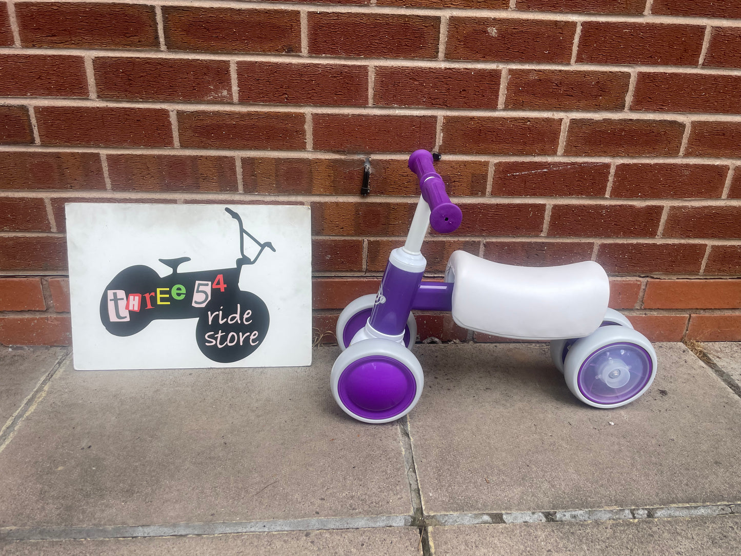 Baby Balance Bike, ***LAST ONE*** 10 months to 36 months, white/purple, rear wheels light up when they spin, nationwide delivery or collection from our Warwickshire shop.