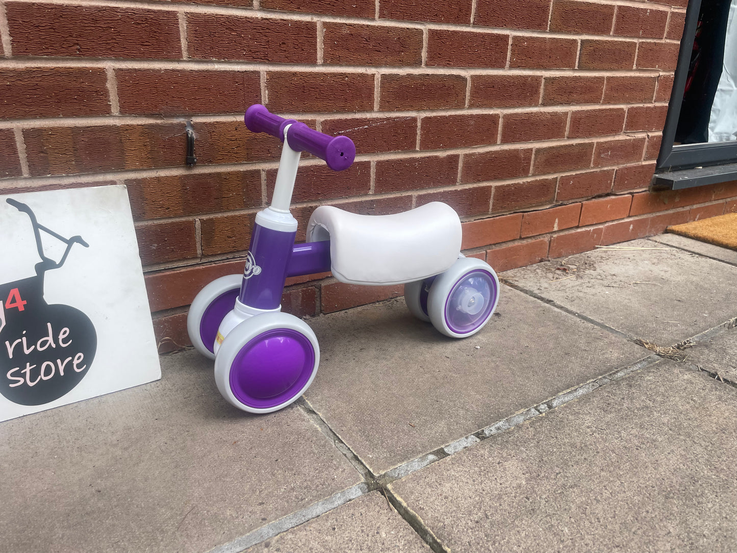 Baby Balance Bike, ***LAST ONE*** 10 months to 36 months, white/purple, rear wheels light up when they spin, nationwide delivery or collection from our Warwickshire shop.