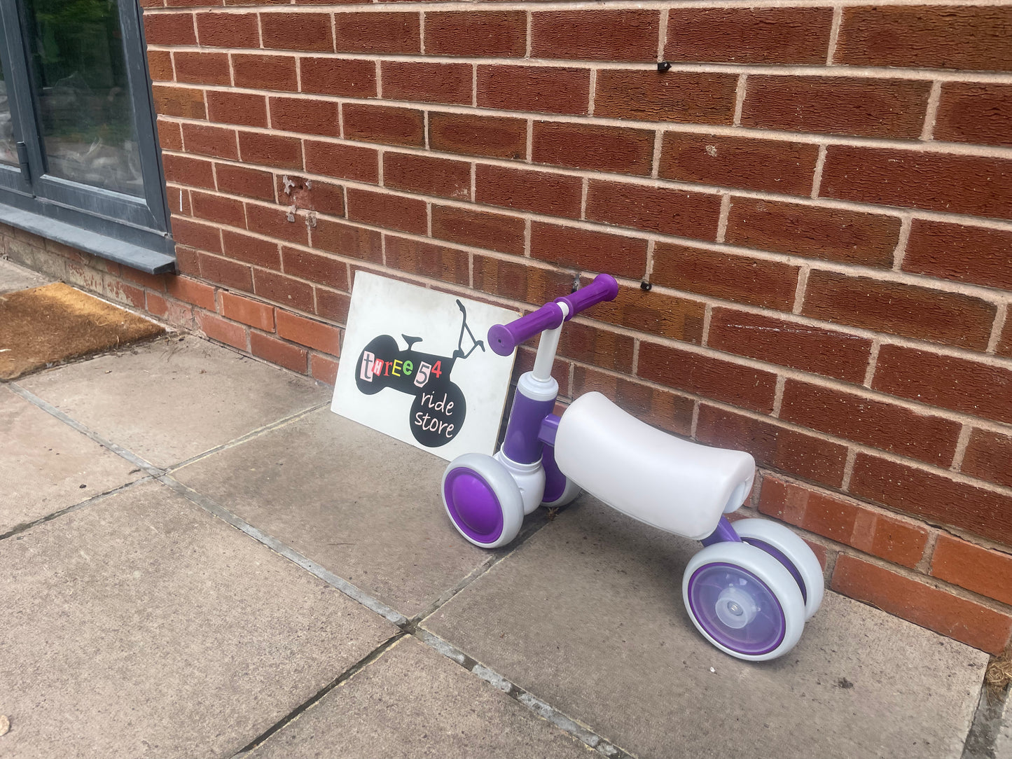Baby Balance Bike, ***LAST ONE*** 10 months to 36 months, white/purple, rear wheels light up when they spin, nationwide delivery or collection from our Warwickshire shop.