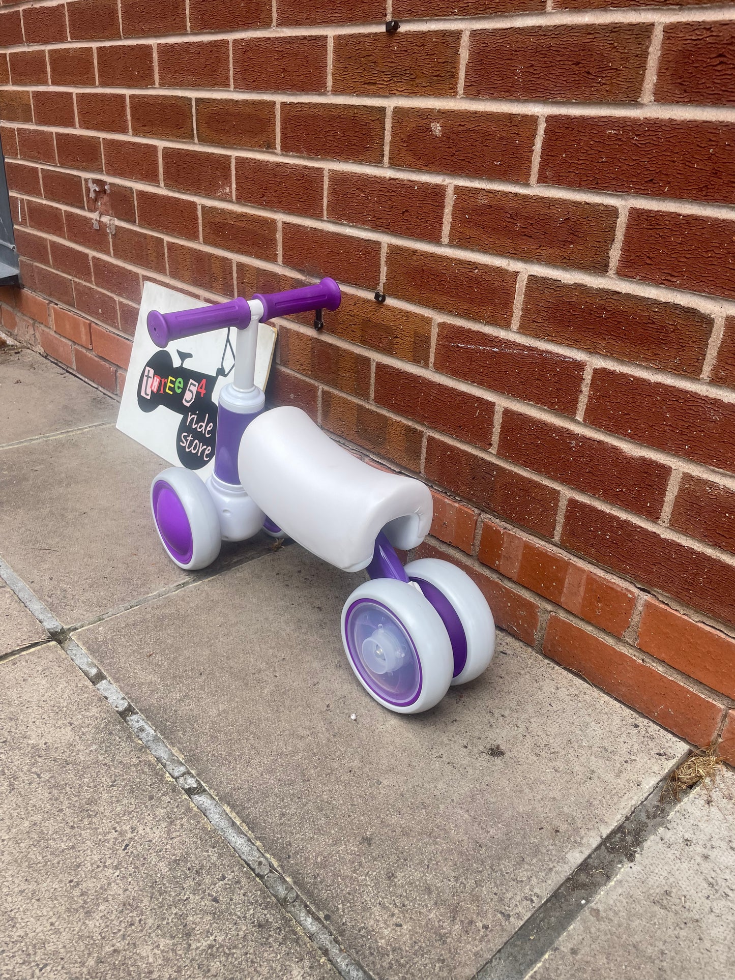 Baby Balance Bike, ***LAST ONE*** 10 months to 36 months, white/purple, rear wheels light up when they spin, nationwide delivery or collection from our Warwickshire shop.