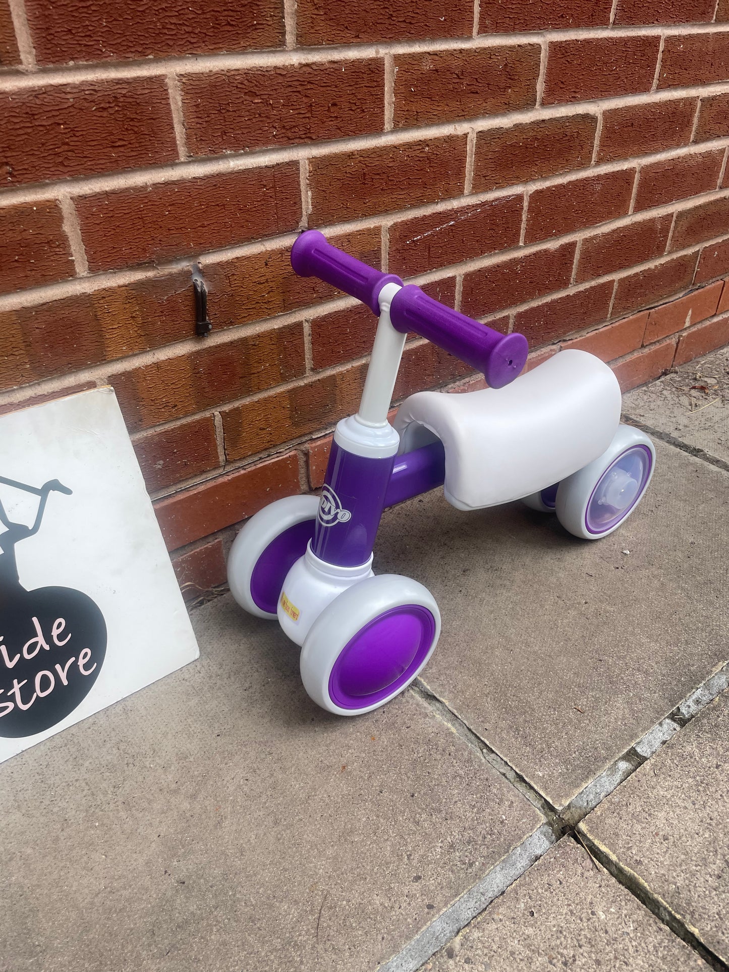 Baby Balance Bike, ***LAST ONE*** 10 months to 36 months, white/purple, rear wheels light up when they spin, nationwide delivery or collection from our Warwickshire shop.