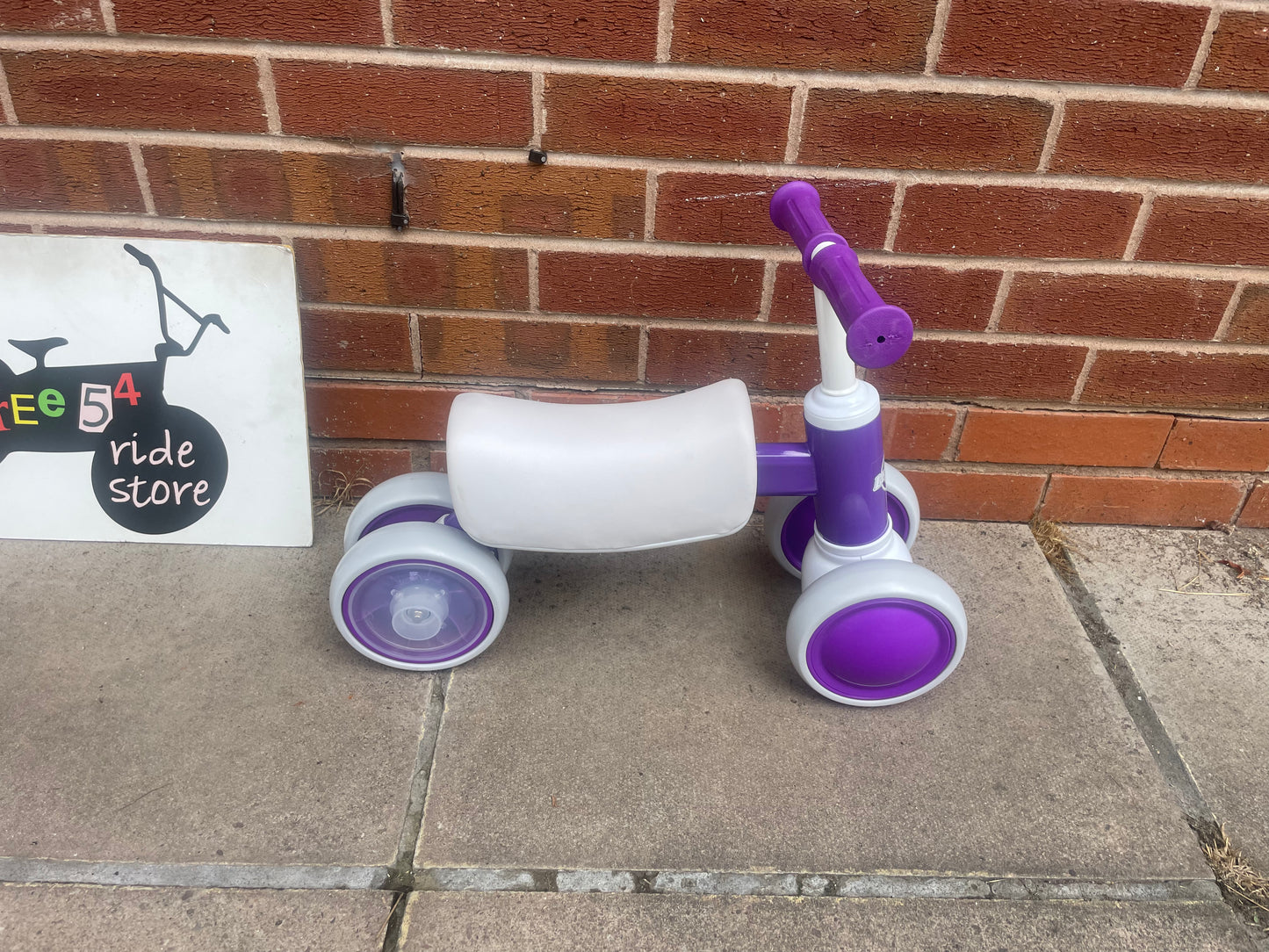 Baby Balance Bike, ***LAST ONE*** 10 months to 36 months, white/purple, rear wheels light up when they spin, nationwide delivery or collection from our Warwickshire shop.