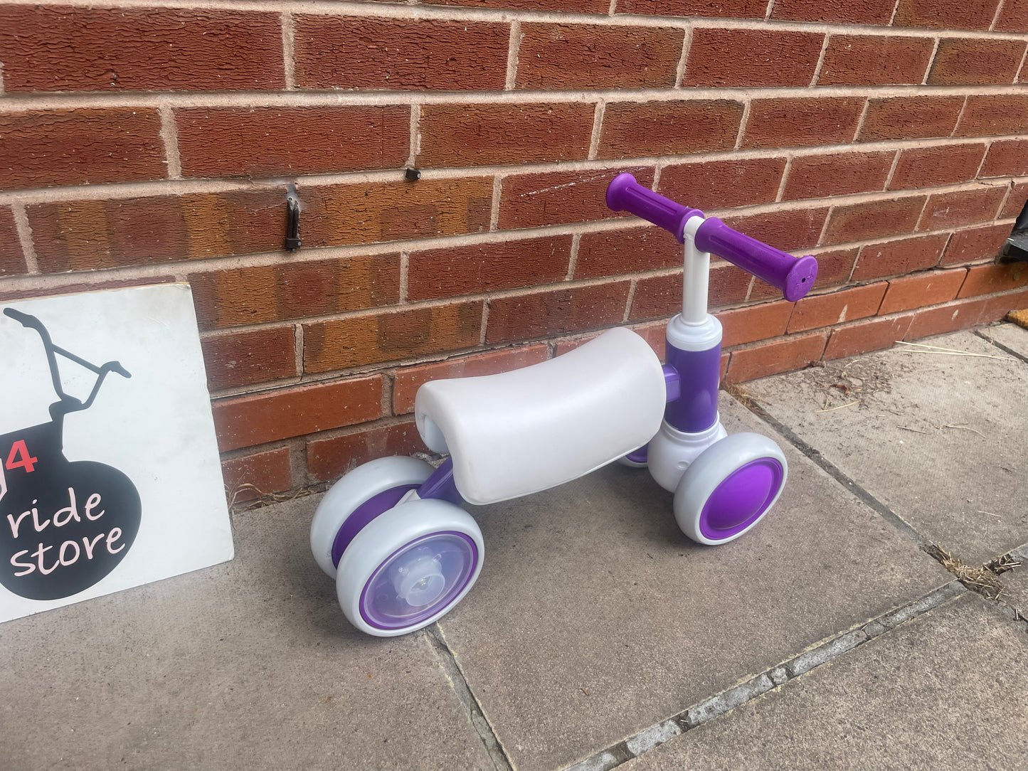 Baby Balance Bike, ***LAST ONE*** 10 months to 36 months, white/purple, rear wheels light up when they spin, nationwide delivery or collection from our Warwickshire shop.