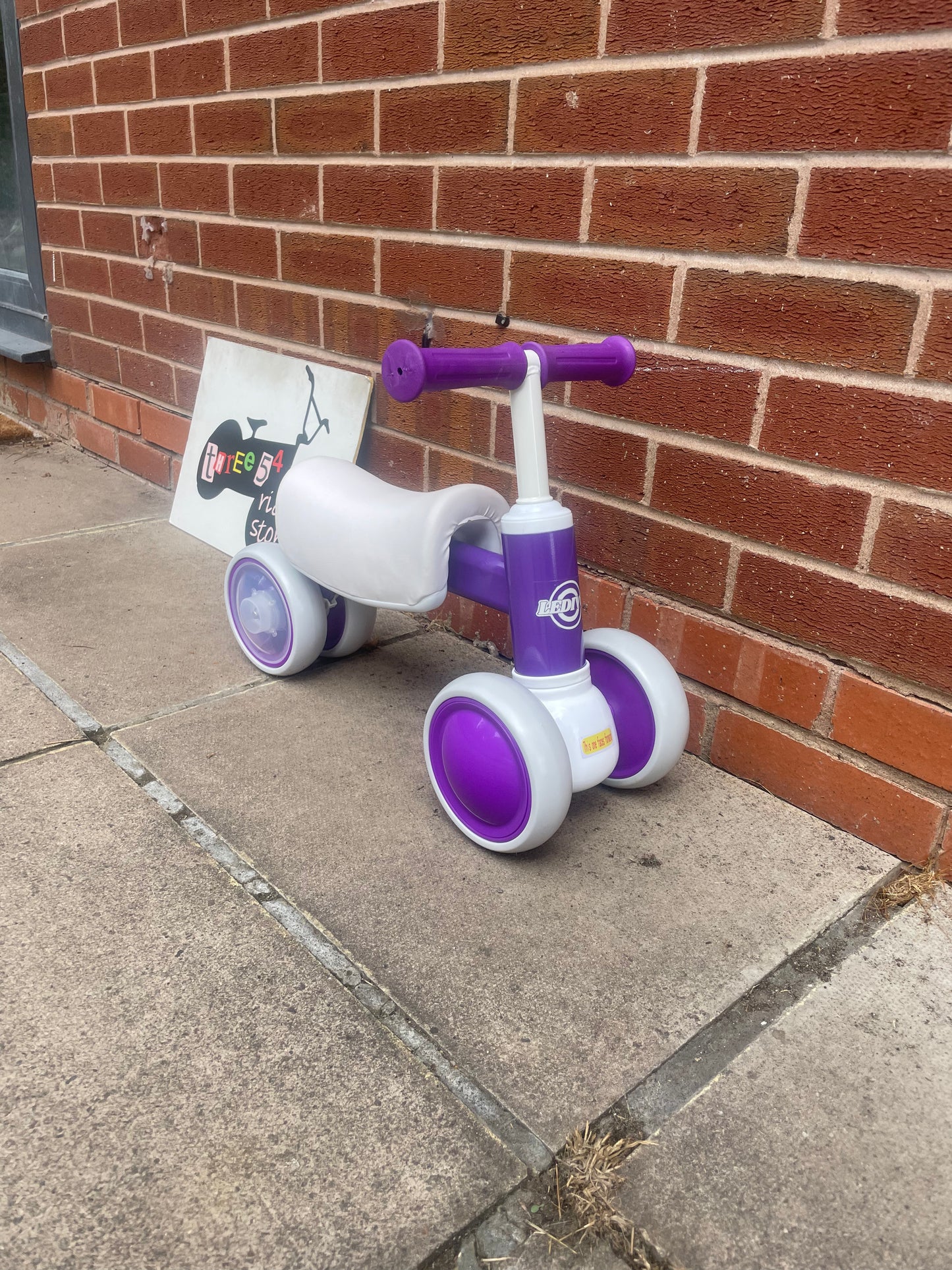 Baby Balance Bike, ***LAST ONE*** 10 months to 36 months, white/purple, rear wheels light up when they spin, nationwide delivery or collection from our Warwickshire shop.