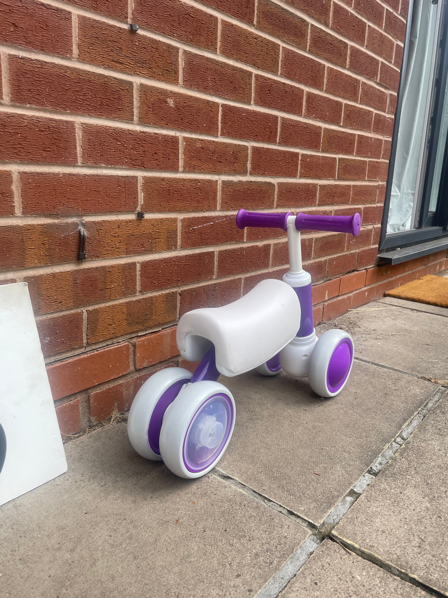 Baby Balance Bike, ***LAST ONE*** 10 months to 36 months, white/purple, rear wheels light up when they spin, nationwide delivery or collection from our Warwickshire shop.