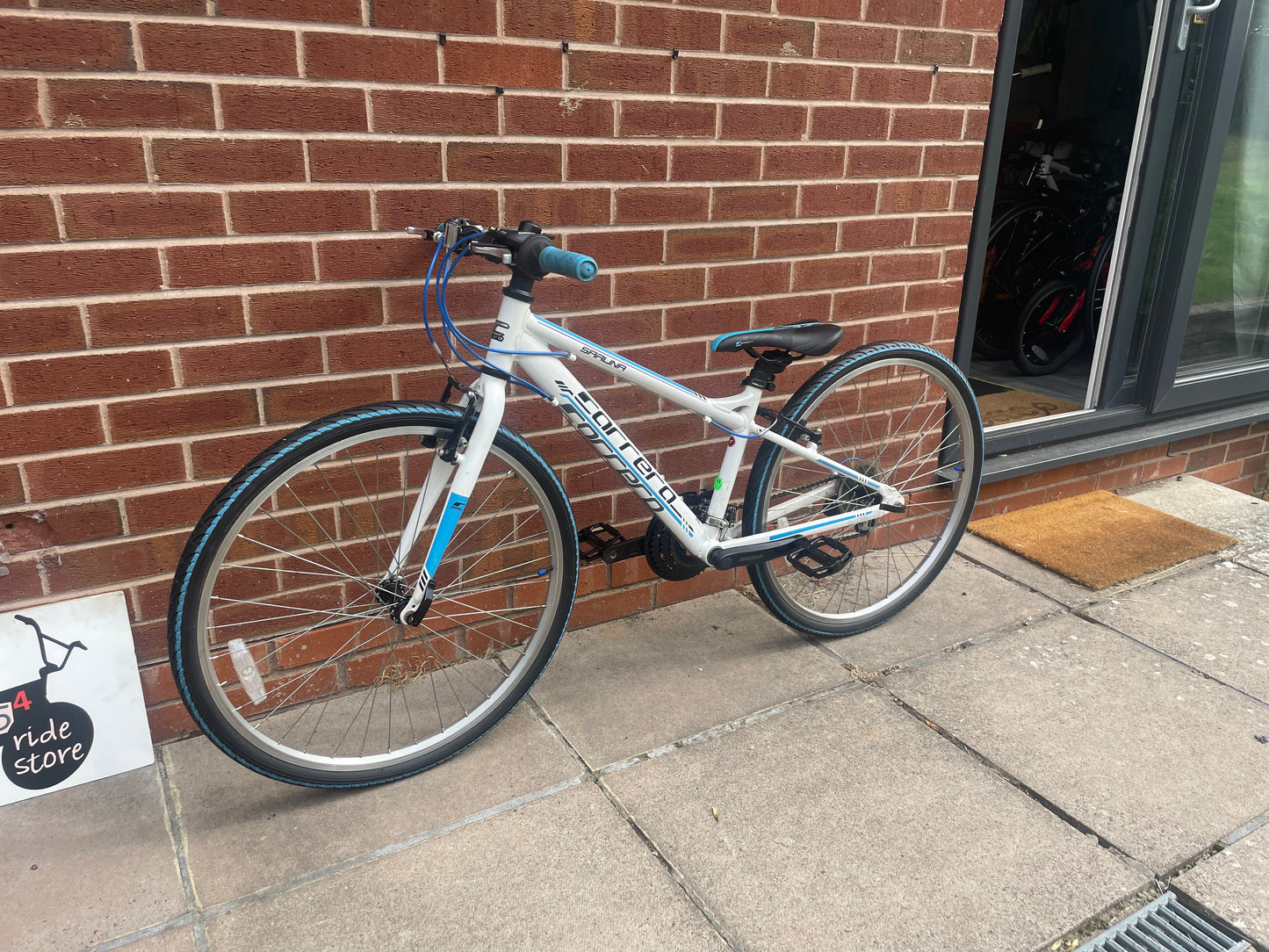 A Pre Loved Carrera For Sale, 26” Carrera Saruna, white and blue, 21 speed, V brakes, very lightweight, nationwide delivery is available.