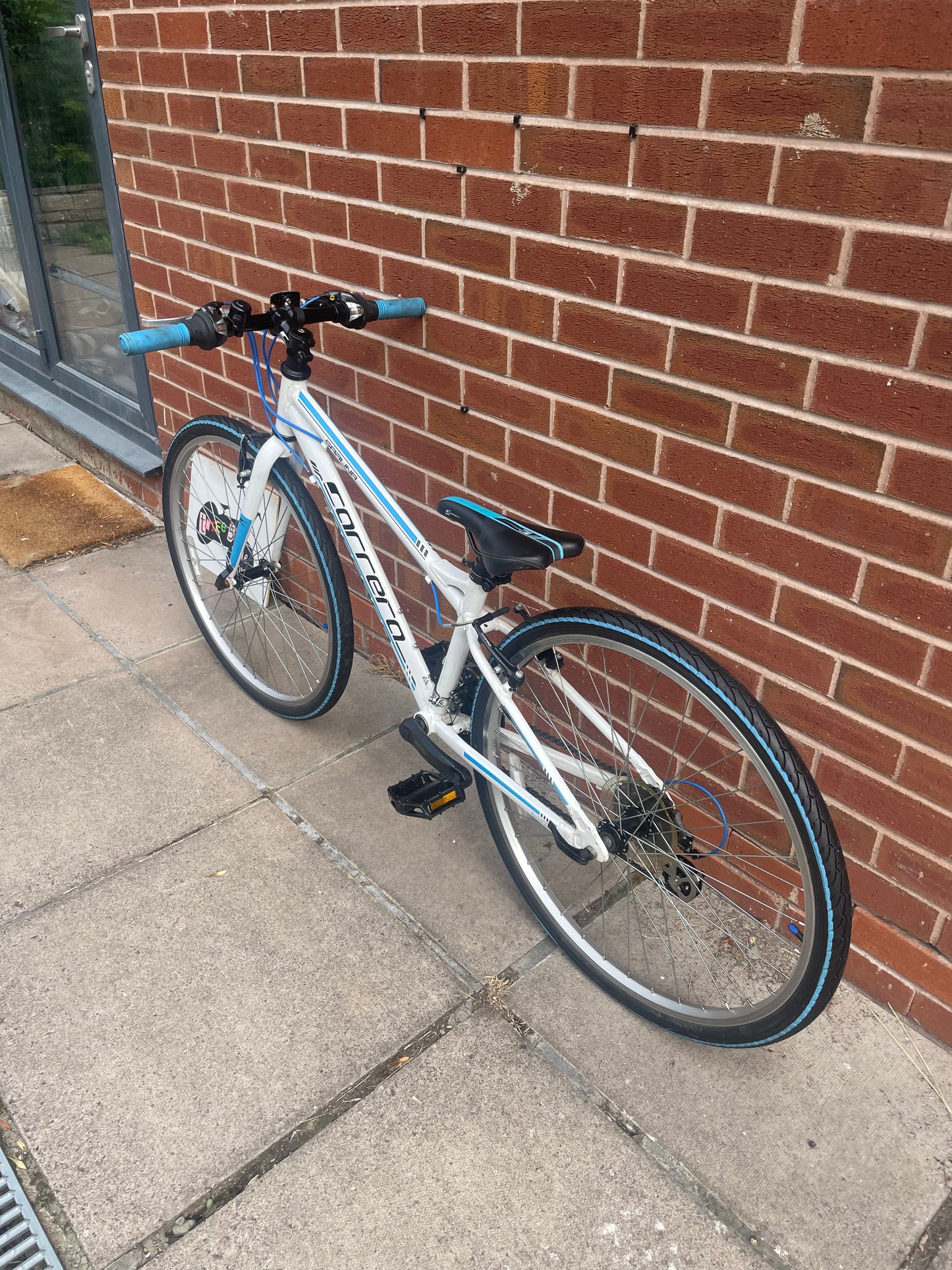 A Pre Loved Carrera For Sale, 26” Carrera Saruna, white and blue, 21 speed, V brakes, very lightweight, nationwide delivery is available.