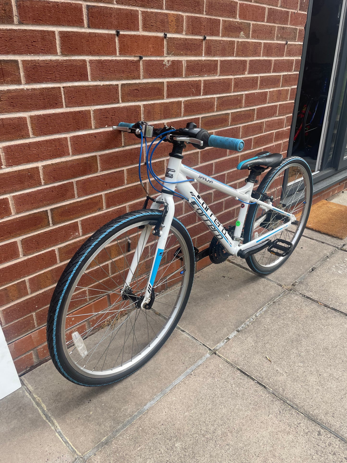 A Pre Loved Carrera For Sale, 26” Carrera Saruna, white and blue, 21 speed, V brakes, very lightweight, nationwide delivery is available.