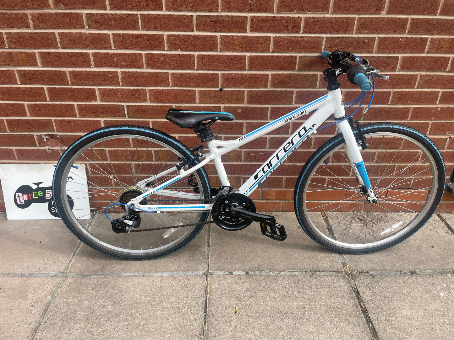 A Pre Loved Carrera For Sale, 26” Carrera Saruna, white and blue, 21 speed, V brakes, very lightweight, nationwide delivery is available.
