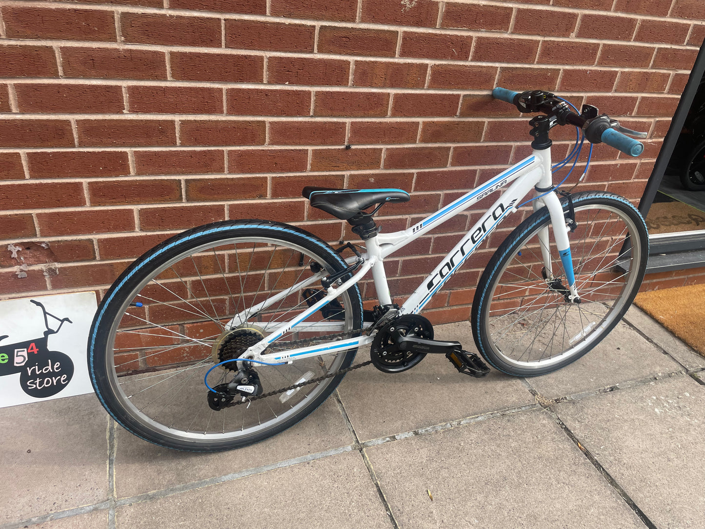 A Pre Loved Carrera For Sale, 26” Carrera Saruna, white and blue, 21 speed, V brakes, very lightweight, nationwide delivery is available.