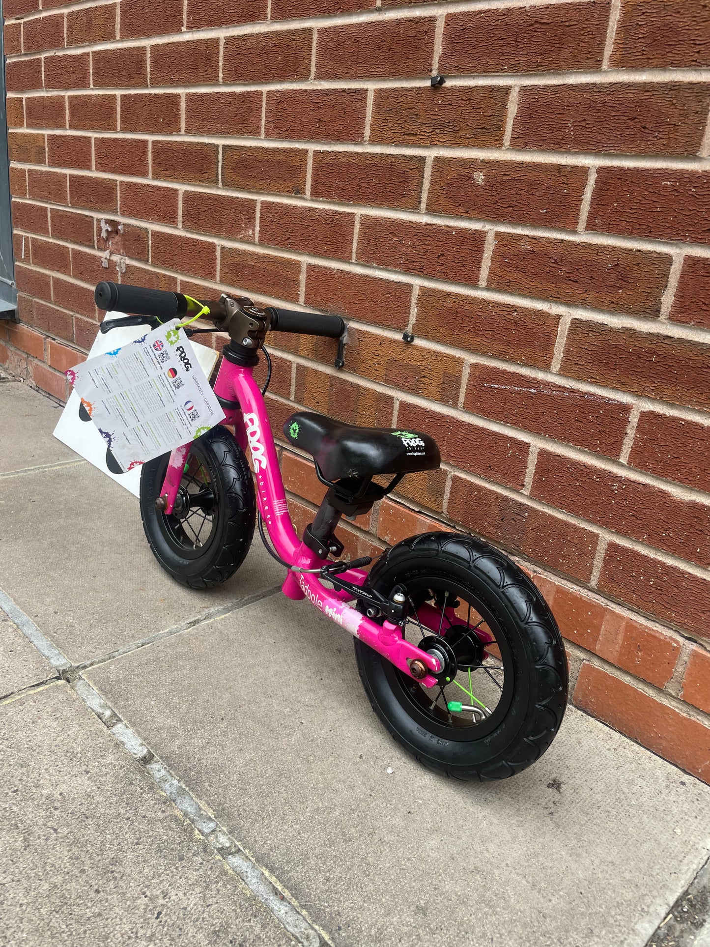 A Pre Loved Frog Bike For Sale, Pink Frog Tadpole Mini balance bike, rear V brake, very lightweight, nationwide delivery is available.