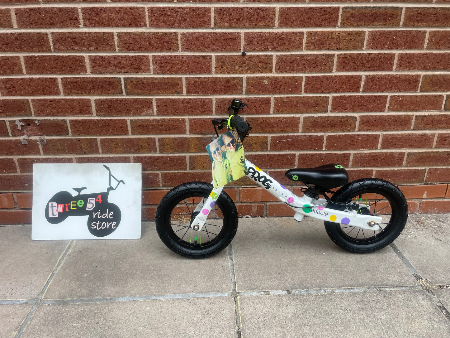 A Pre Loved Frog Bike For Sale, White/Spotty Frog Tadpole Balance Bike, rear V brake, padded seat, nationwide delivery is available.