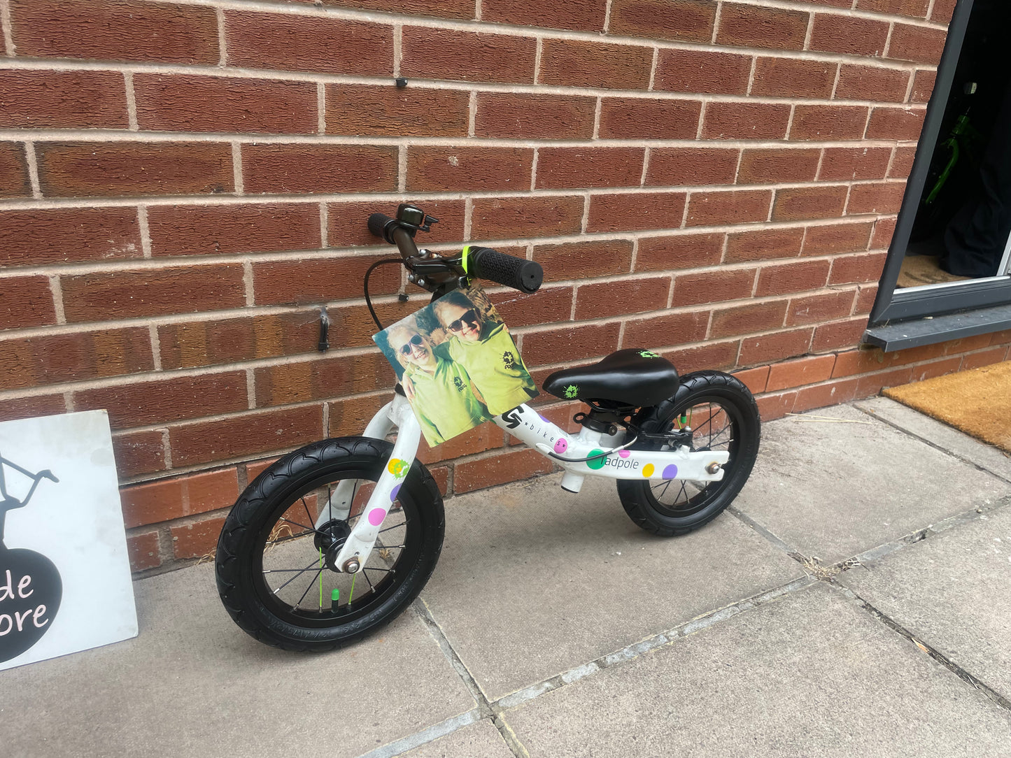 A Pre Loved Frog Bike For Sale, White/Spotty Frog Tadpole Balance Bike, rear V brake, padded seat, nationwide delivery is available.