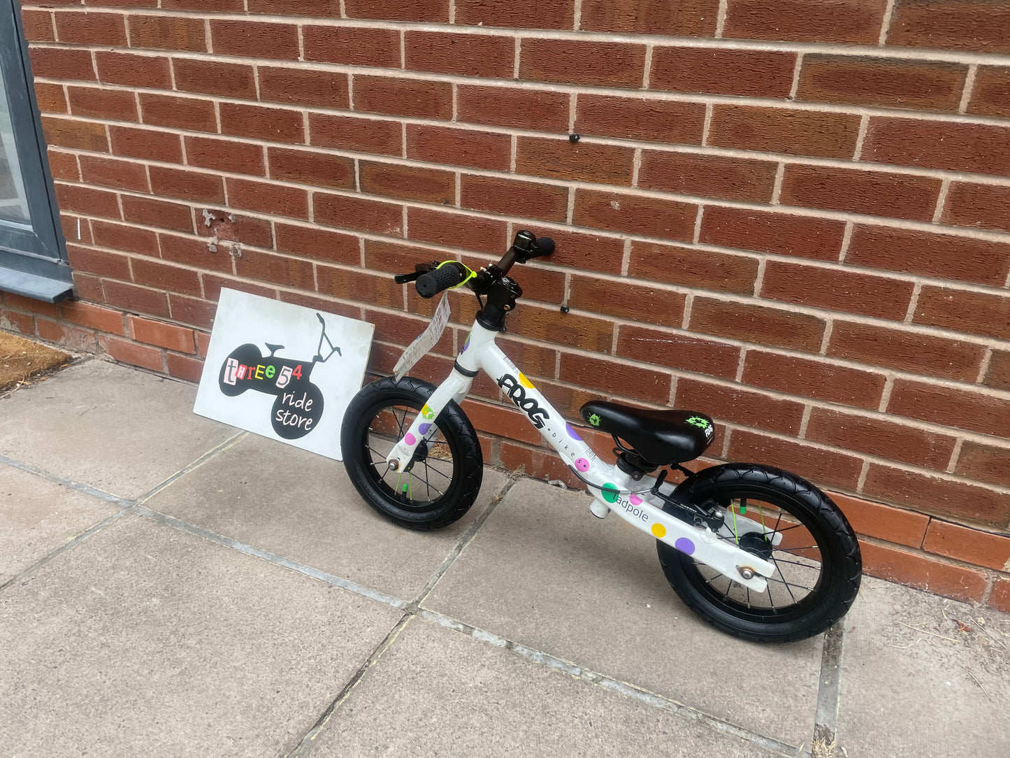 A Pre Loved Frog Bike For Sale, White/Spotty Frog Tadpole Balance Bike, rear V brake, padded seat, nationwide delivery is available.