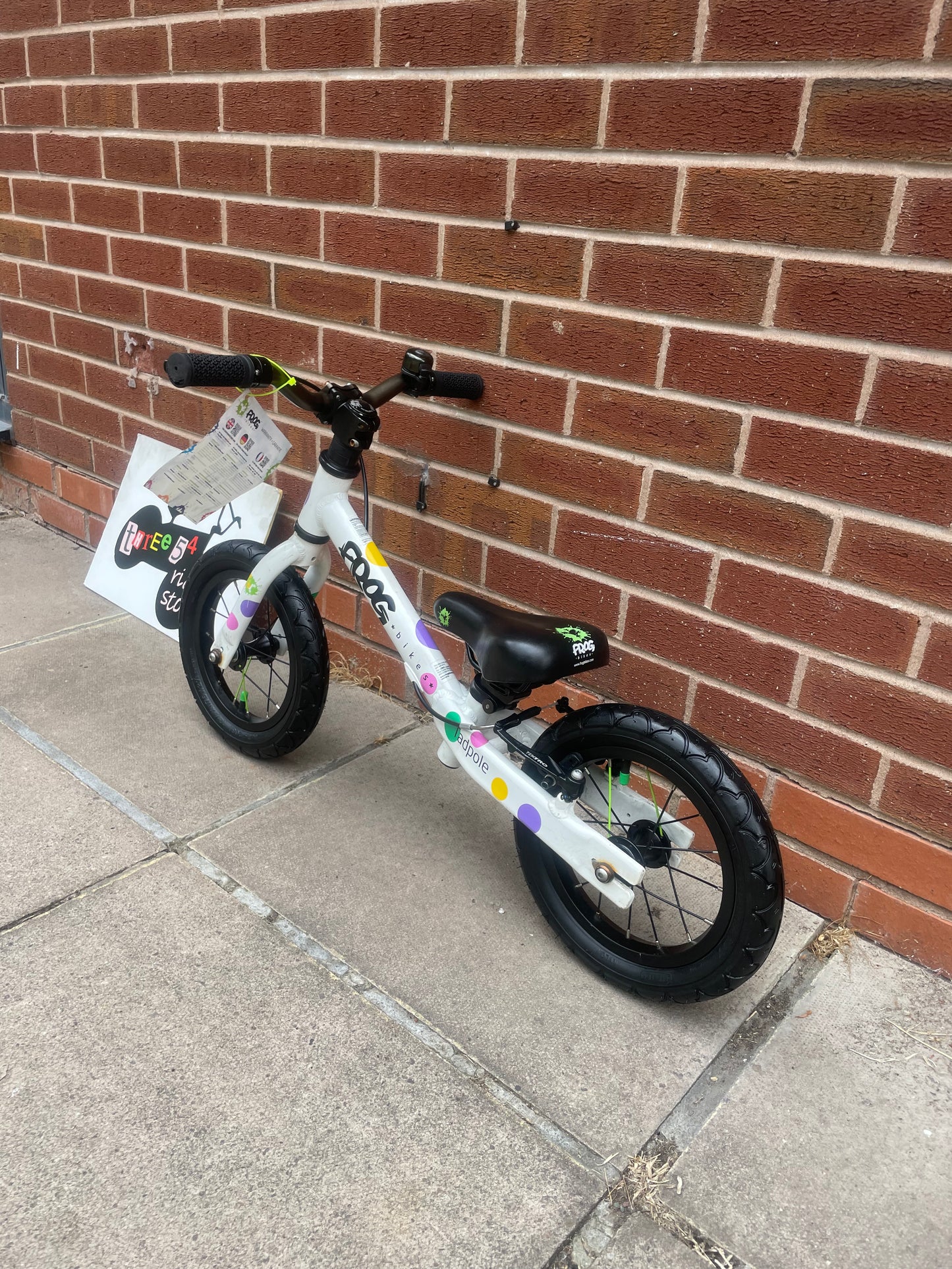 A Pre Loved Frog Bike For Sale, White/Spotty Frog Tadpole Balance Bike, rear V brake, padded seat, nationwide delivery is available.