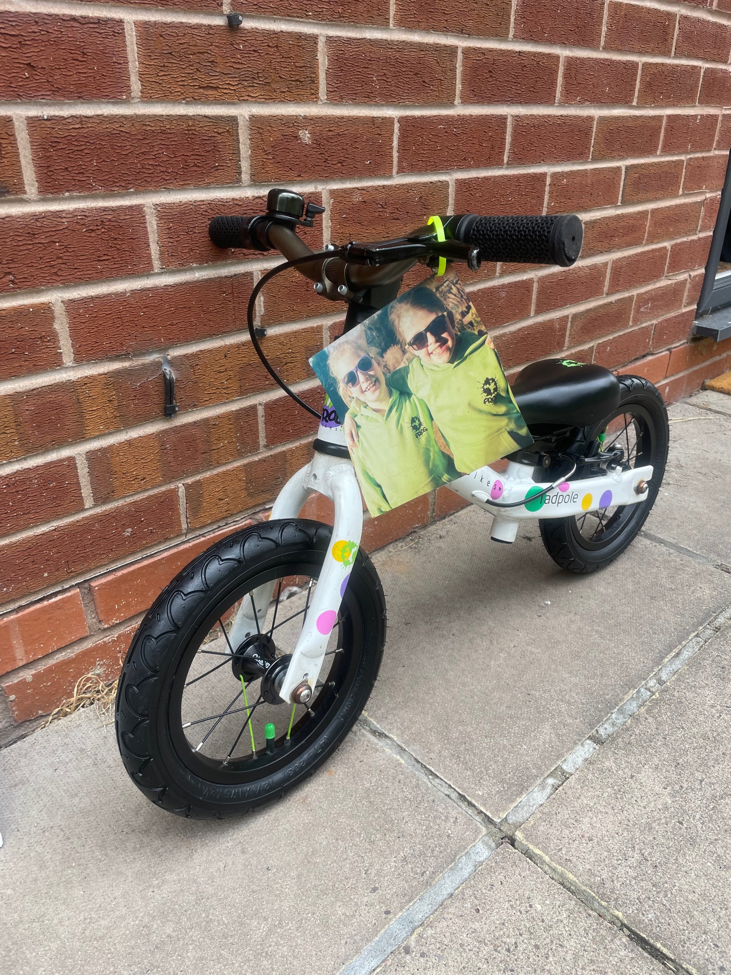 A Pre Loved Frog Bike For Sale, White/Spotty Frog Tadpole Balance Bike, rear V brake, padded seat, nationwide delivery is available.