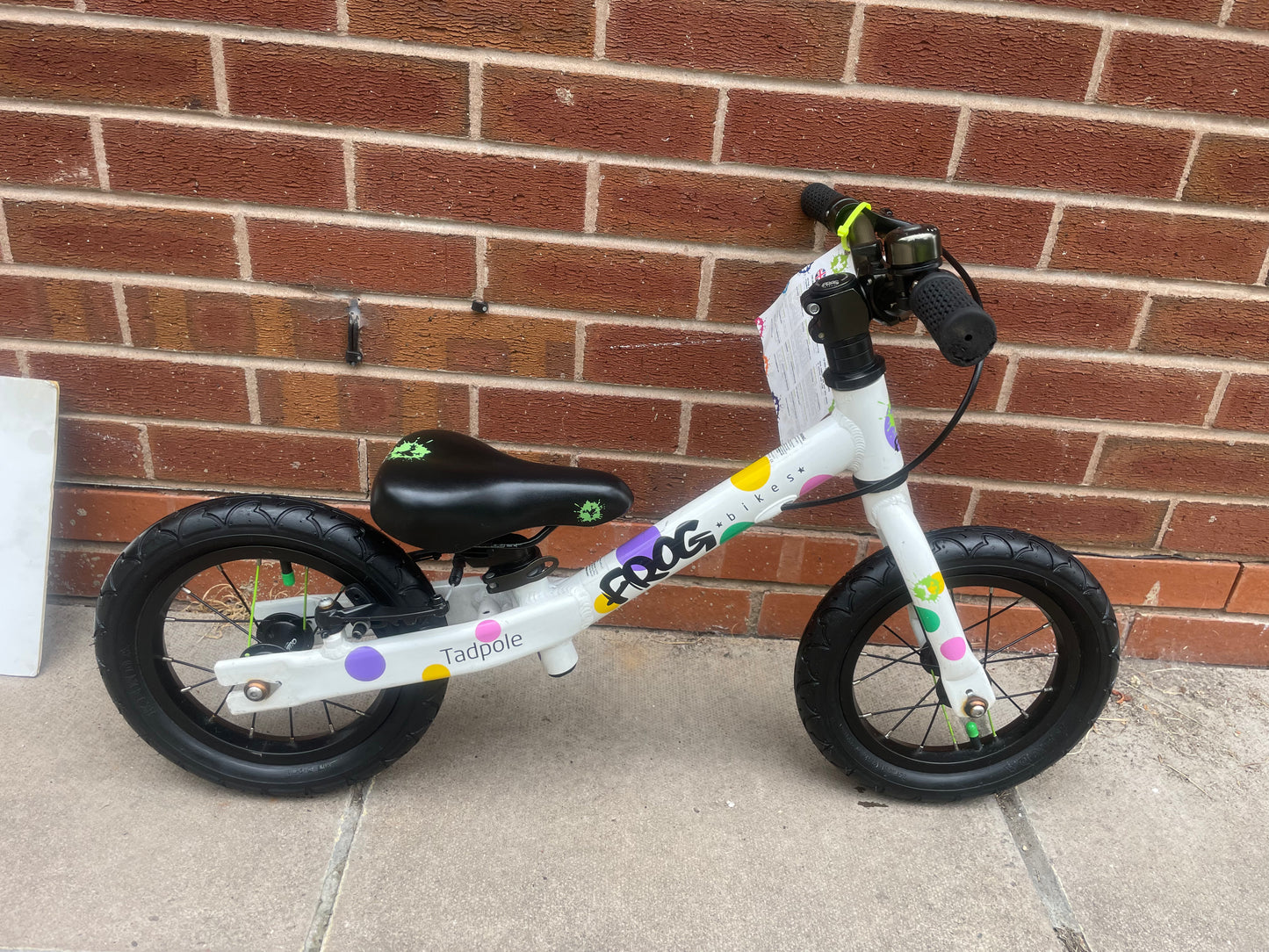 A Pre Loved Frog Bike For Sale, White/Spotty Frog Tadpole Balance Bike, rear V brake, padded seat, nationwide delivery is available.