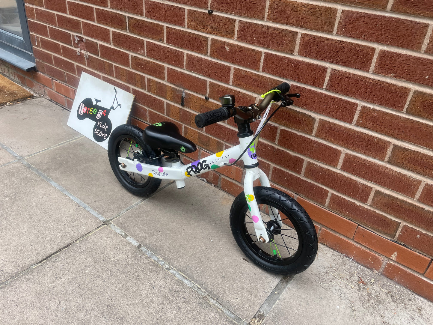 A Pre Loved Frog Bike For Sale, White/Spotty Frog Tadpole Balance Bike, rear V brake, padded seat, nationwide delivery is available.