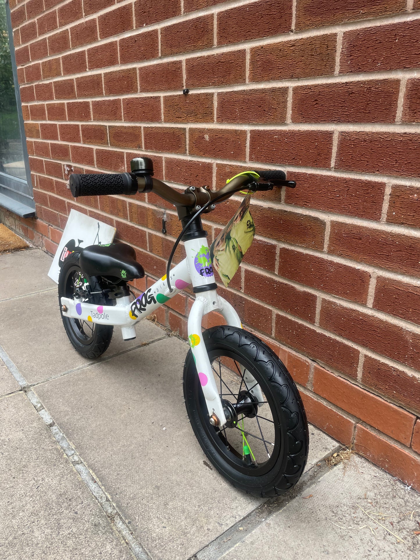 A Pre Loved Frog Bike For Sale, White/Spotty Frog Tadpole Balance Bike, rear V brake, padded seat, nationwide delivery is available.