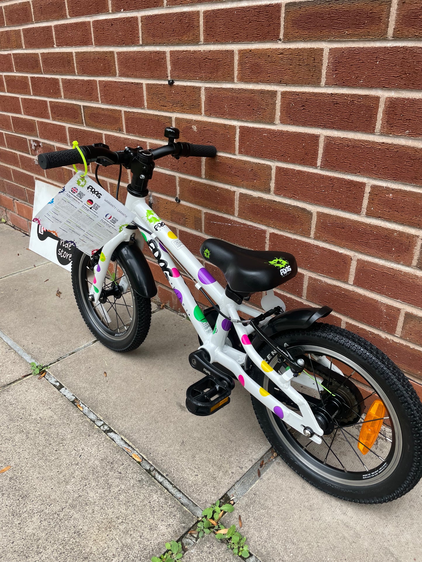 A Pre Loved Frog Bike For Sale, White Spotty Frog 40 first pedal bike, 14” wheels, single speed, padded seat, V brakes, fully enclosed chain, mudguards, nationwide delivery is available.