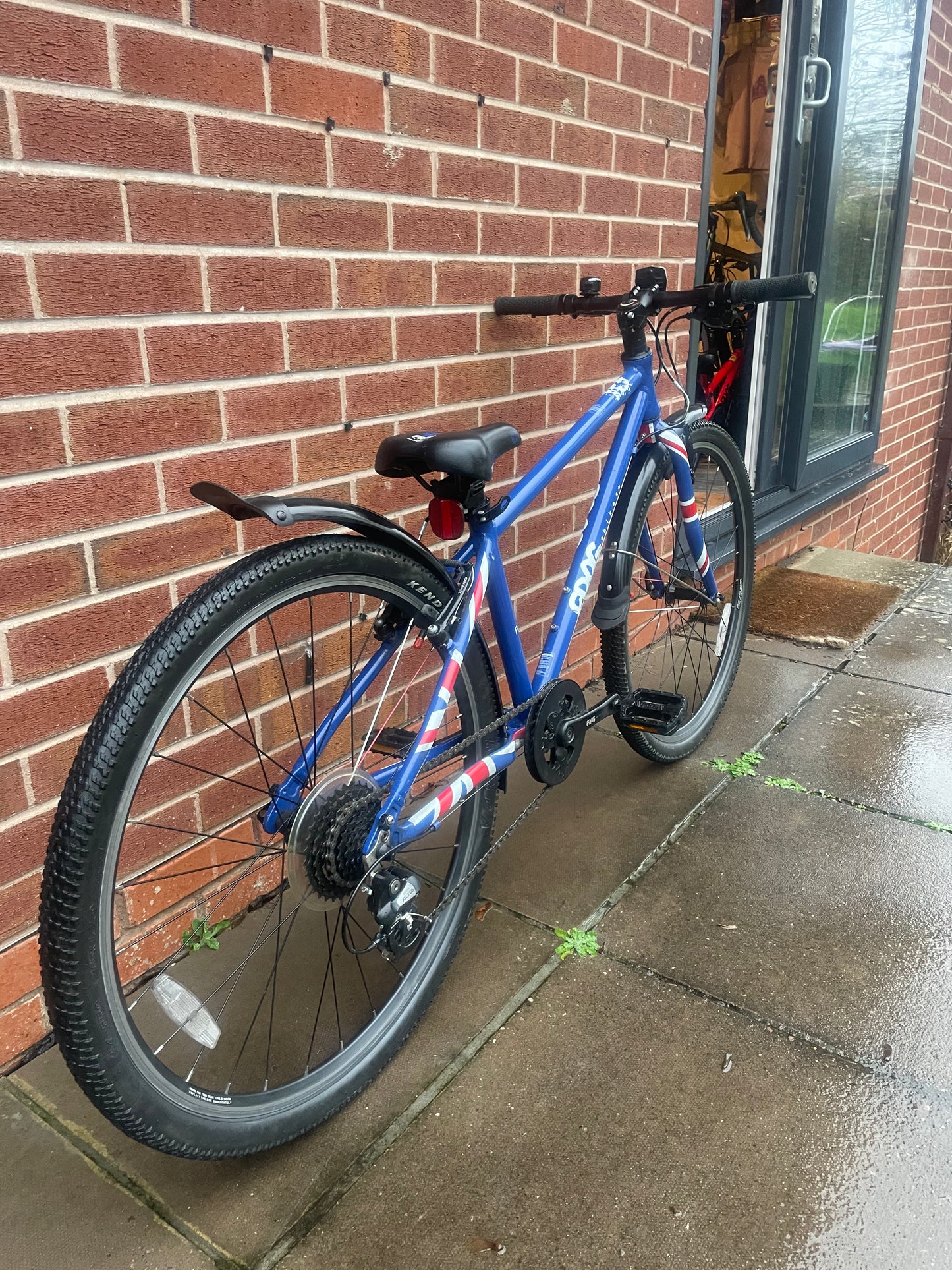 A Pre Loved Frog Bike For Sale, Blue Frog 69 26” wheel hybrid bicycle, 8 speed, V brakes, mudguards, very lightweight, nationwide delivery is available.