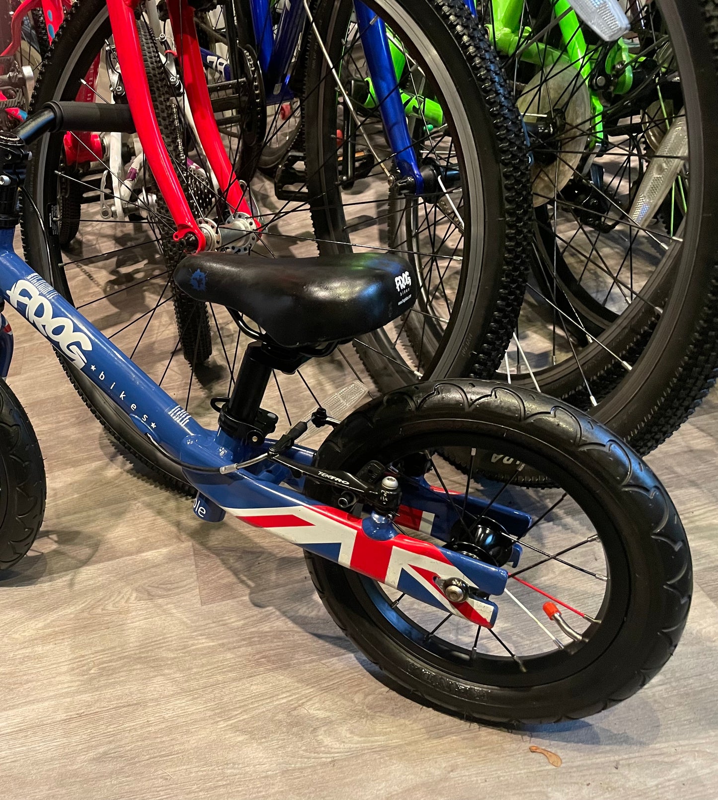 A Pre Loved Frog Bike For Sale, Blue Frog Tadpole Balance Bike, very lightweight, rear V brake, padded seat, excellent condition, nationwide delivery is available.