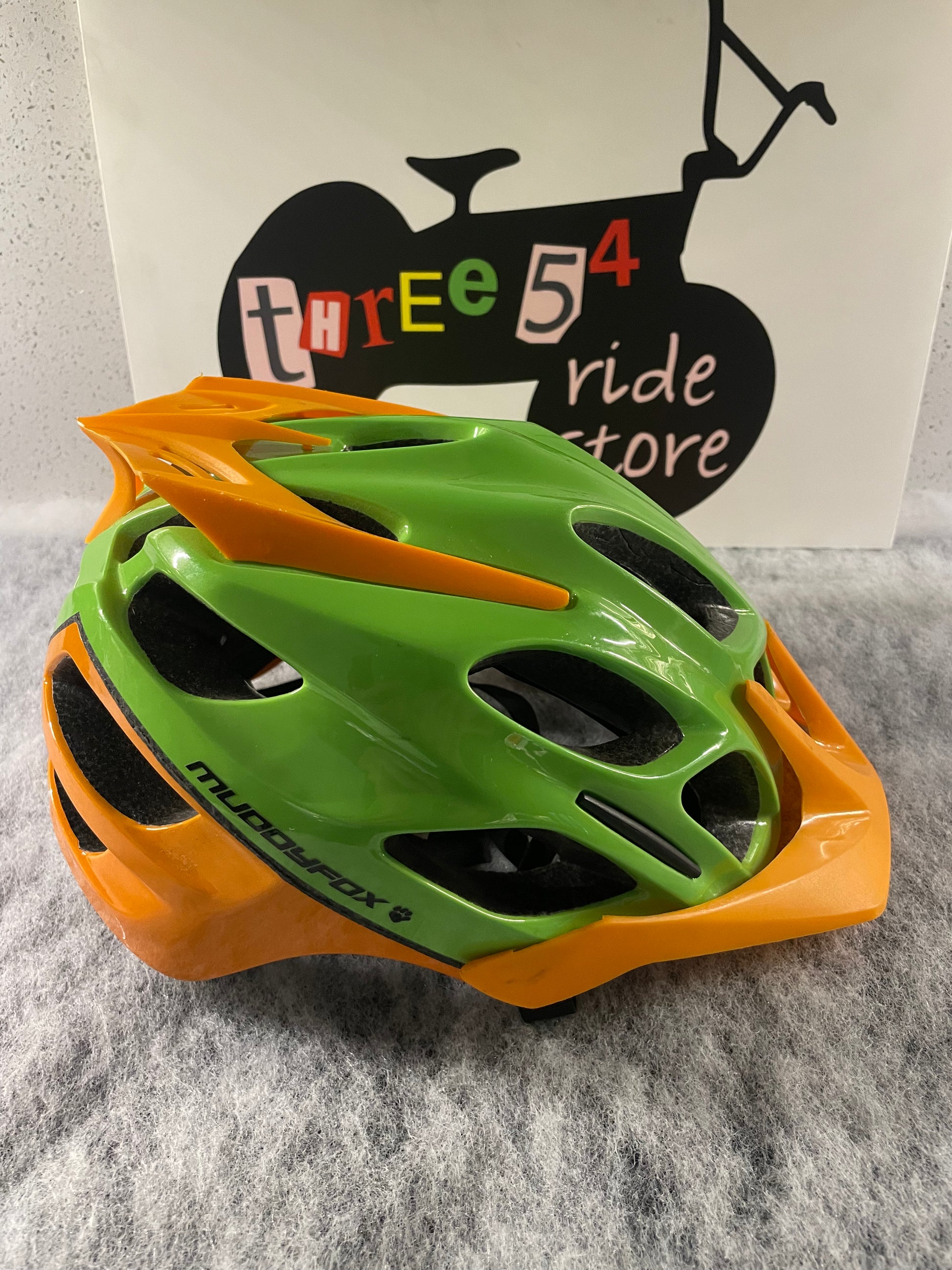 Muddyfox adult mountain bike helmet green and orange Large 58cm 62cm