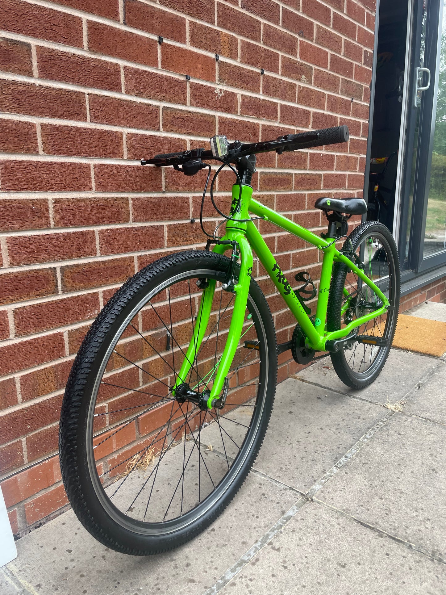 A Pre Loved Frog Bike For Sale, Green Frog 69 Hybrid Bike, 26” wheels, 8 gears, V brakes, bottle cage, 3 months warranty, nationwide delivery is available.