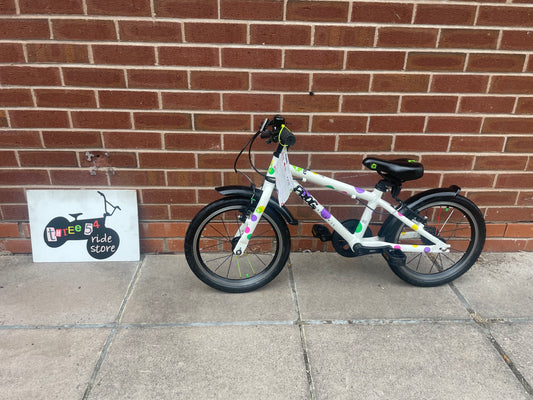 A Pre Loved Frog Bike For Sale, Frog 48 44 first pedal bike, white spotty, 16” wheels, V brakes, padded seat, nationwide delivery is available.