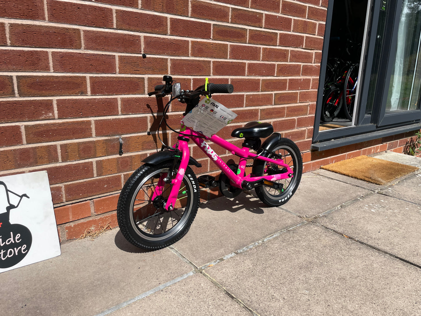 A Pre Loved Frog Bike For Sale, Pink Frog 40 first pedal bike, 14” wheels, V brakes, padded seat, very lightweight, nationwide delivery is available.