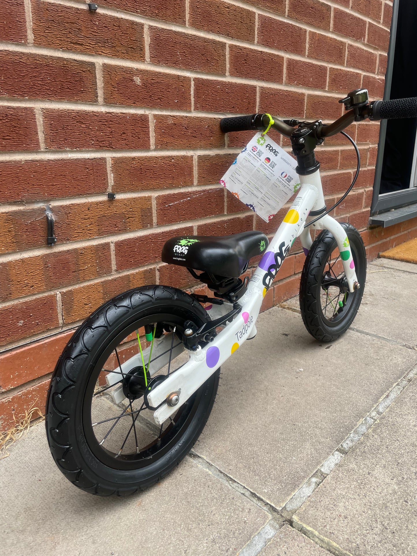 A Pre Loved Frog Bike For Sale, White/Spotty Frog Tadpole Balance Bike, rear V brake, padded seat, nationwide delivery is available.