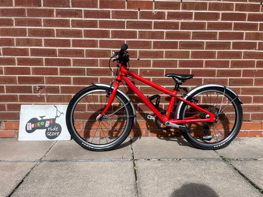 A Pre Loved Isla Bike For Sale, Red Isla Beinn 20s, 20” wheels, 8 speed, mudguards, bottle cage, very lightweight children’s bike, nationwide delivery is available.