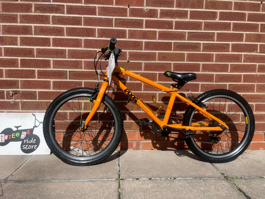 A Pre Loved Frog Bike For Sale, Orange Frog 55 lightweight children’s bicycle, 20” wheels, 8 speed, V brakes, nationwide delivery is available.