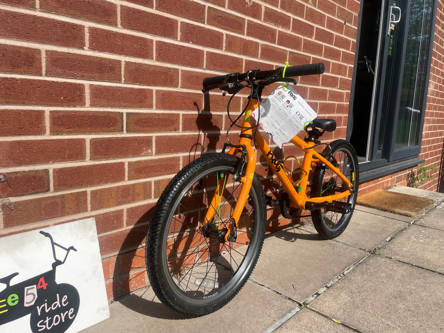 A Pre Loved Frog Bike For Sale, Orange Frog 55 lightweight children’s bicycle, 20” wheels, 8 speed, V brakes, nationwide delivery is available.