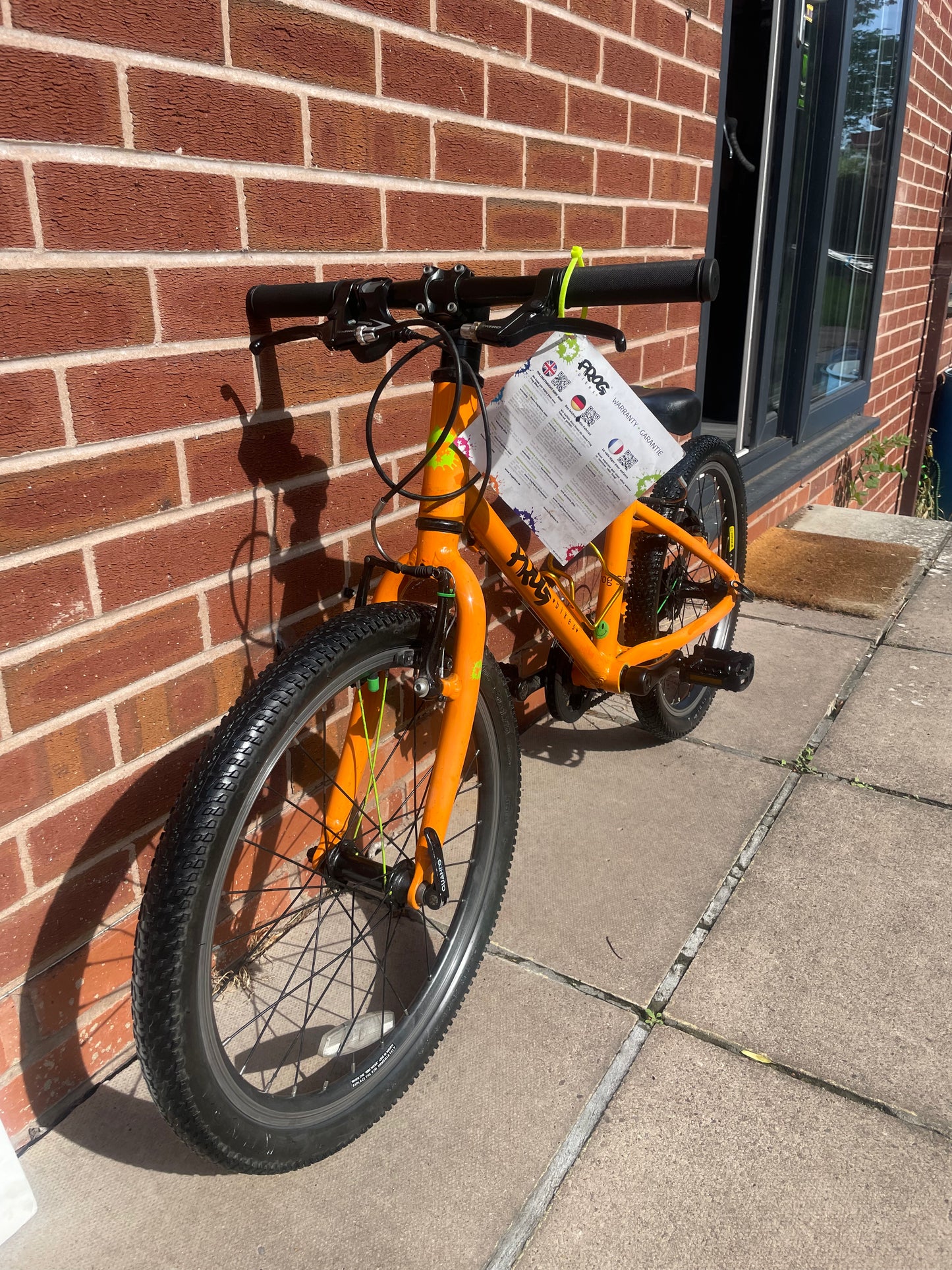 A Pre Loved Frog Bike For Sale, Orange Frog 55 lightweight children’s bicycle, 20” wheels, 8 speed, V brakes, nationwide delivery is available.