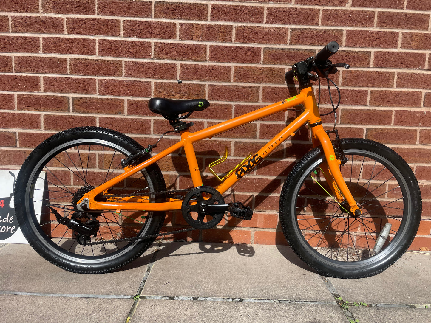 A Pre Loved Frog Bike For Sale, Orange Frog 55 lightweight children’s bicycle, 20” wheels, 8 speed, V brakes, nationwide delivery is available.