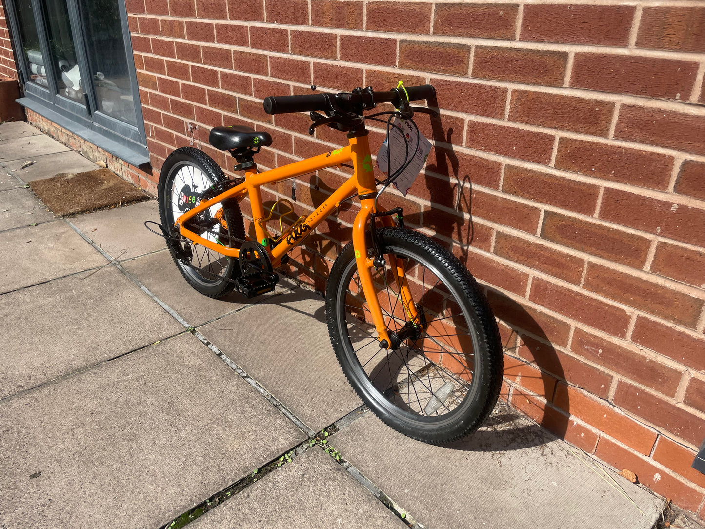 A Pre Loved Frog Bike For Sale, Orange Frog 55 lightweight children’s bicycle, 20” wheels, 8 speed, V brakes, nationwide delivery is available.